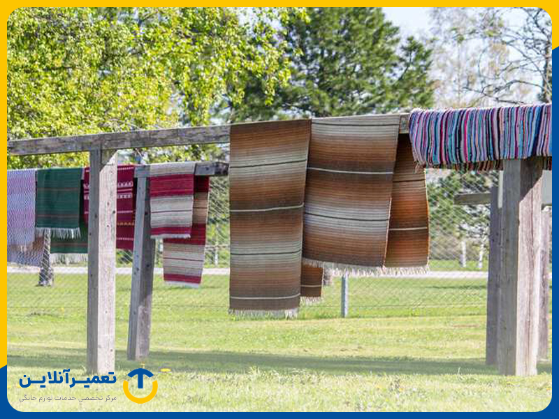 خشک کردن روفرشی در آفتاب بعد از شستن آن در ماشین لباسشویی